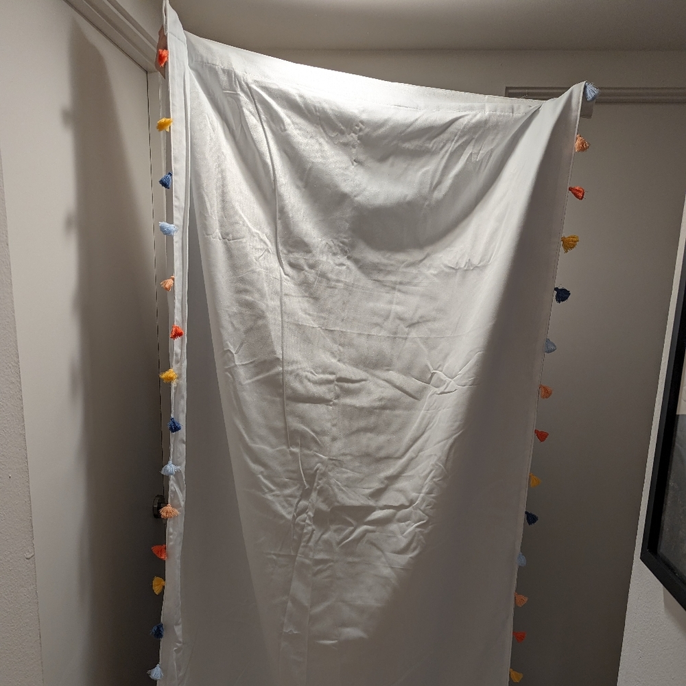 3 Pillowfort 84” Blackout Tassel Kids’ Curtain Panel White